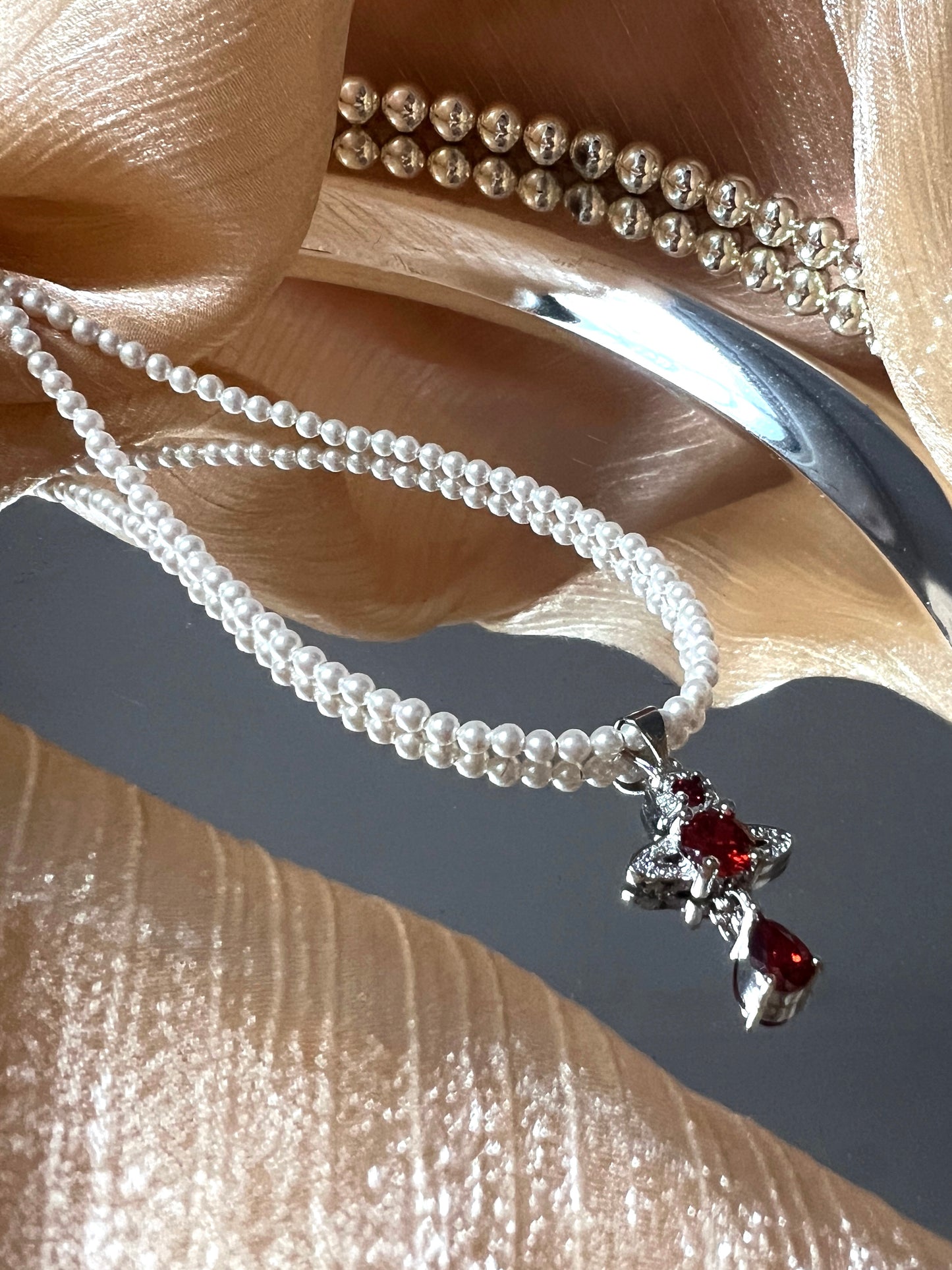 Saturn Ruby Swarovski Crystal Pearl Necklace