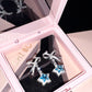 Star Knot Blue Gem Earrings
