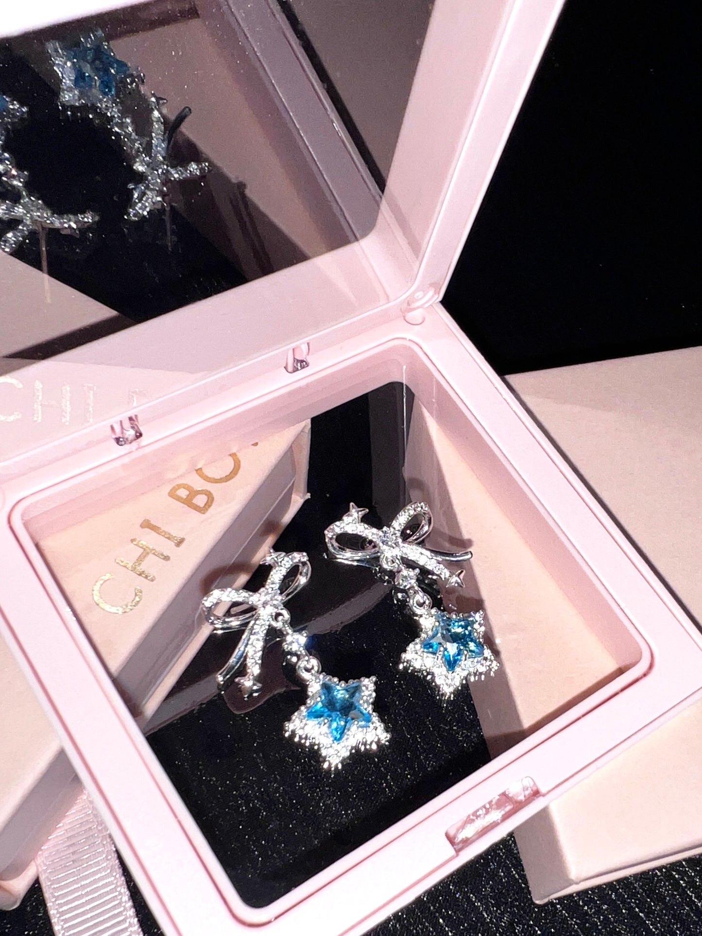 Star Knot Blue Gem Earrings